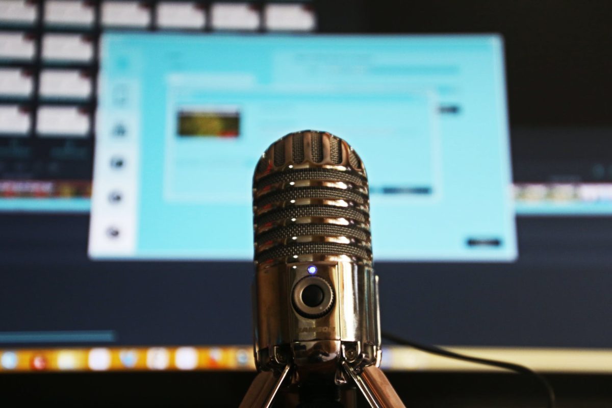 Podcast selective focus photography of gray stainless steel condenser microphone