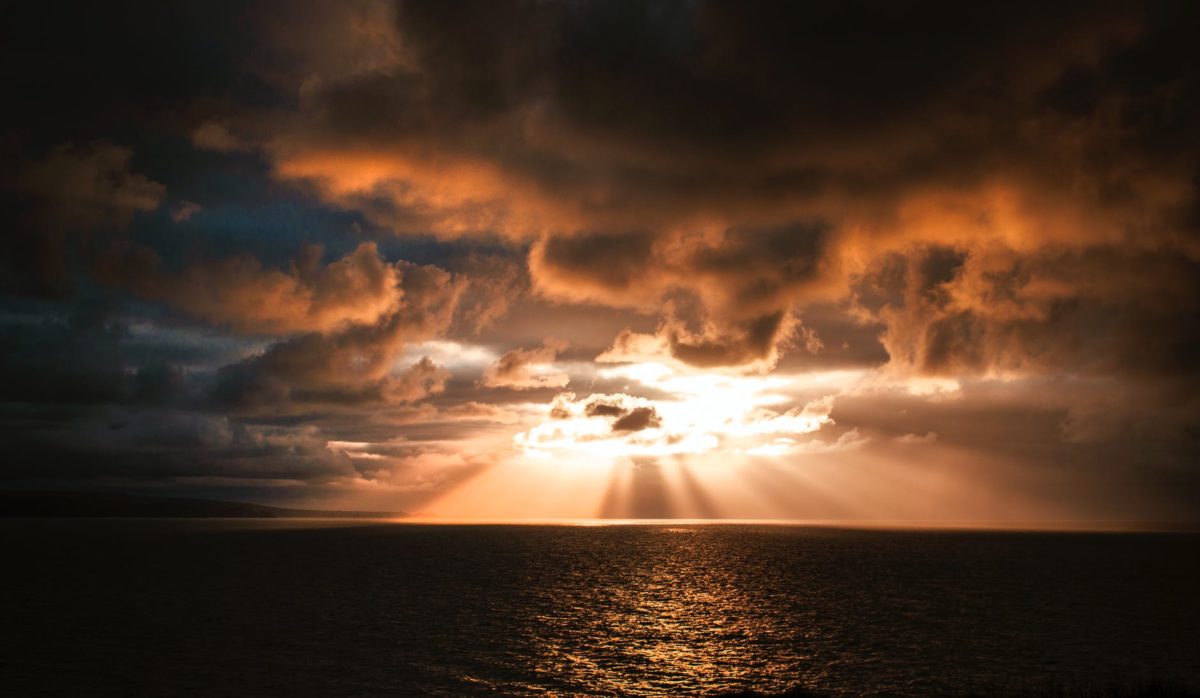 photo of ocean during dawn
